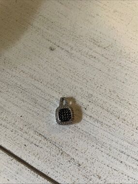 White and black diamond silver pendant